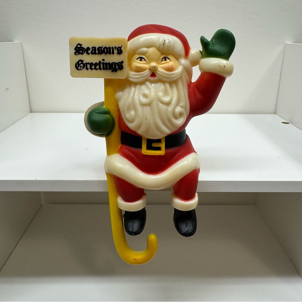 Vintage Santa Clause Stocking Hanger Hard Plastic Season’s Greetings Christmas